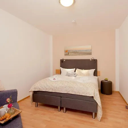 Апартаменты Ahlbecker Hoehe App Strandkorb Херингсдорф